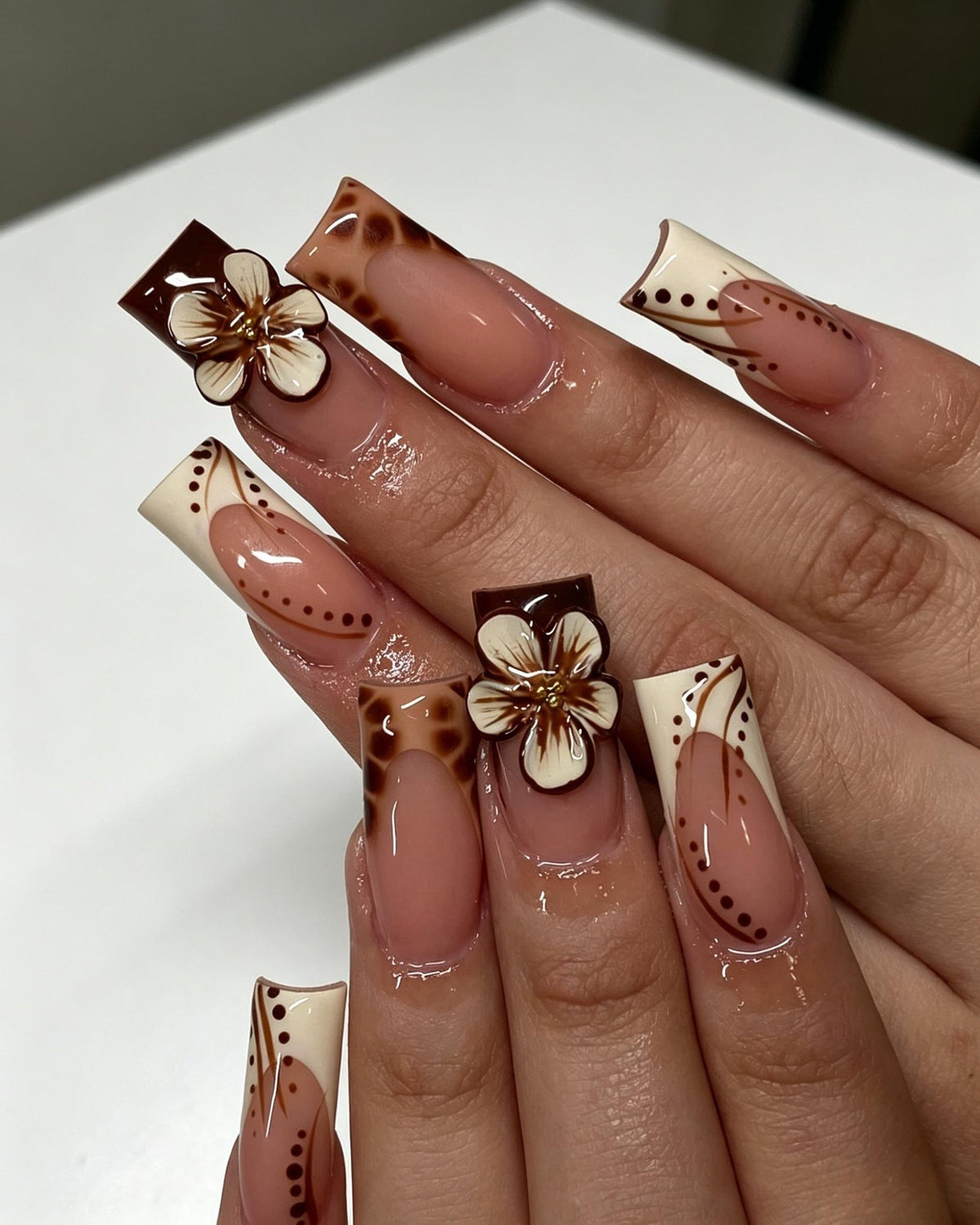 Nude Pink Tortoiseshell French Tip Nails With 3D Cream Flowers