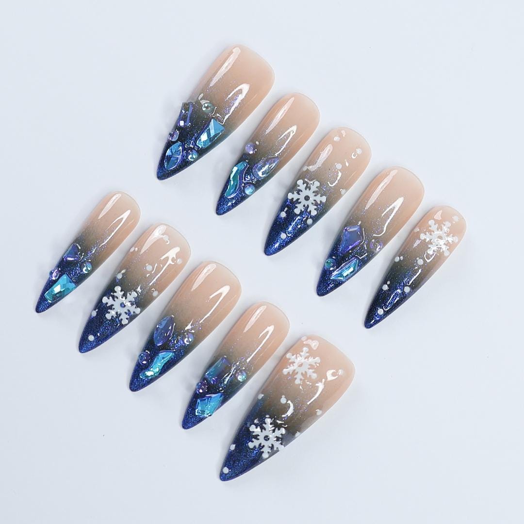 Nude-to-Navy Christmas Snowflake Press-On Nails With Blue Gems