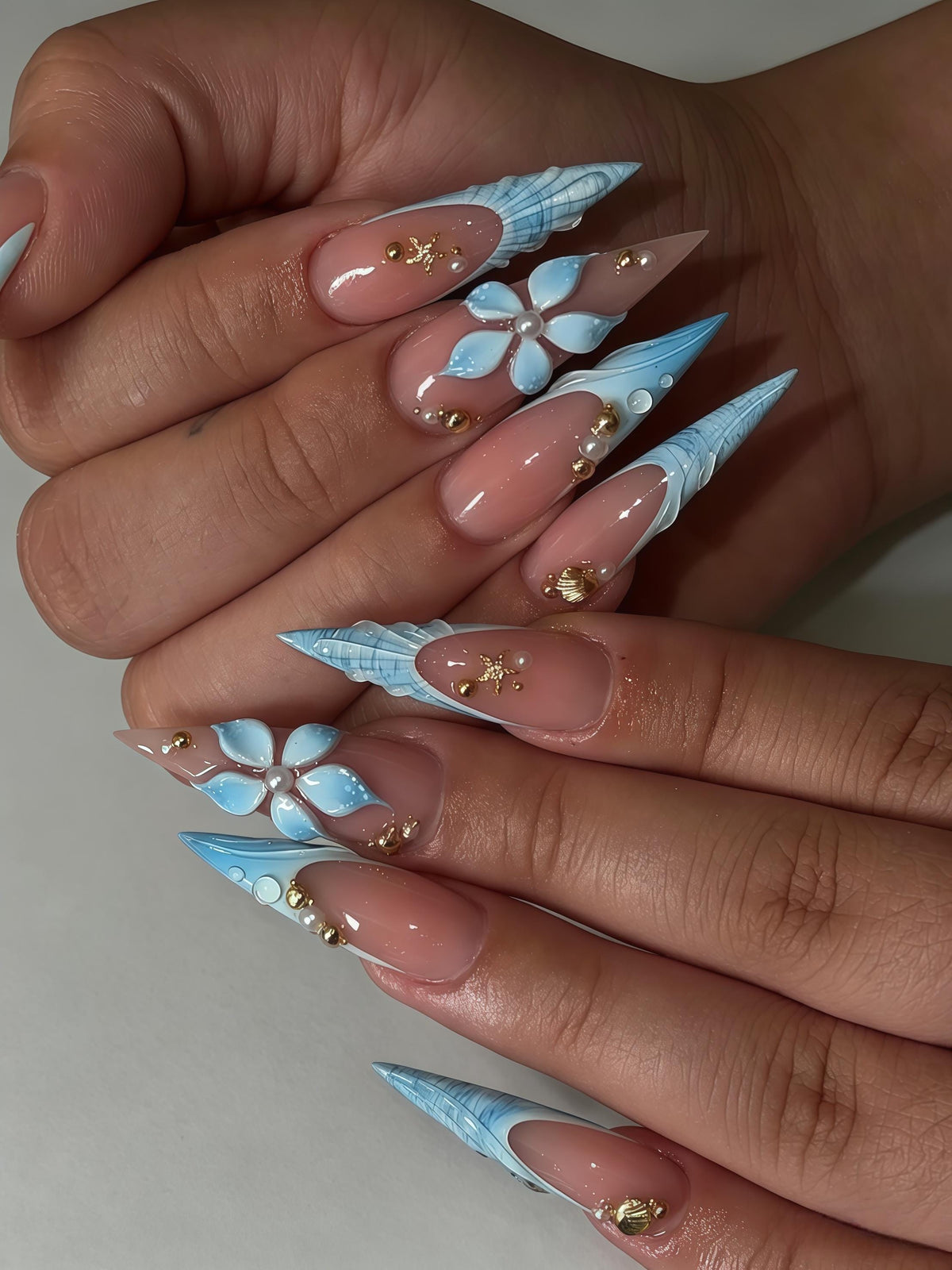 Ocean Blue Shell French Tip Nails With 3D Flowers, Pearls and Gold Accents