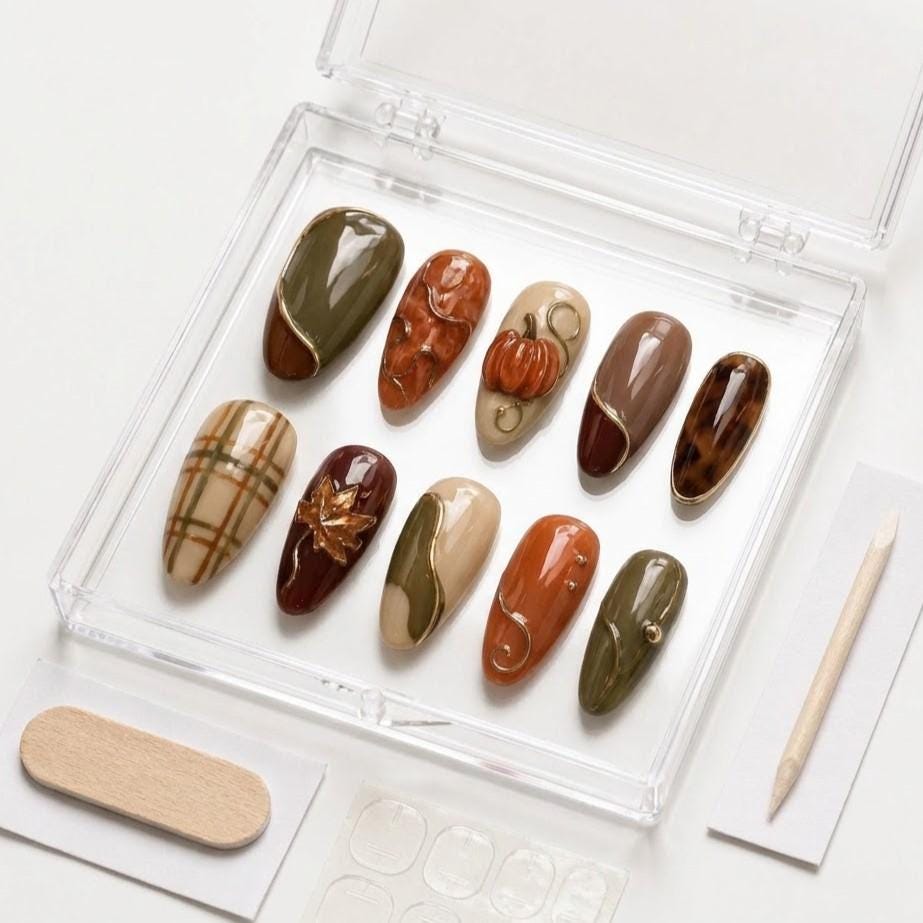 Olive, Rust, and Tortoiseshell Fall Nails With Raised Pumpkin and Leaf Accents