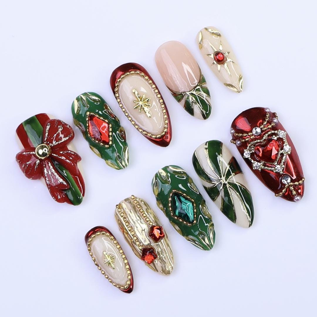 Ornate Christmas Press-On Nails With Red Bow, Emerald Gems and Gold Starbursts