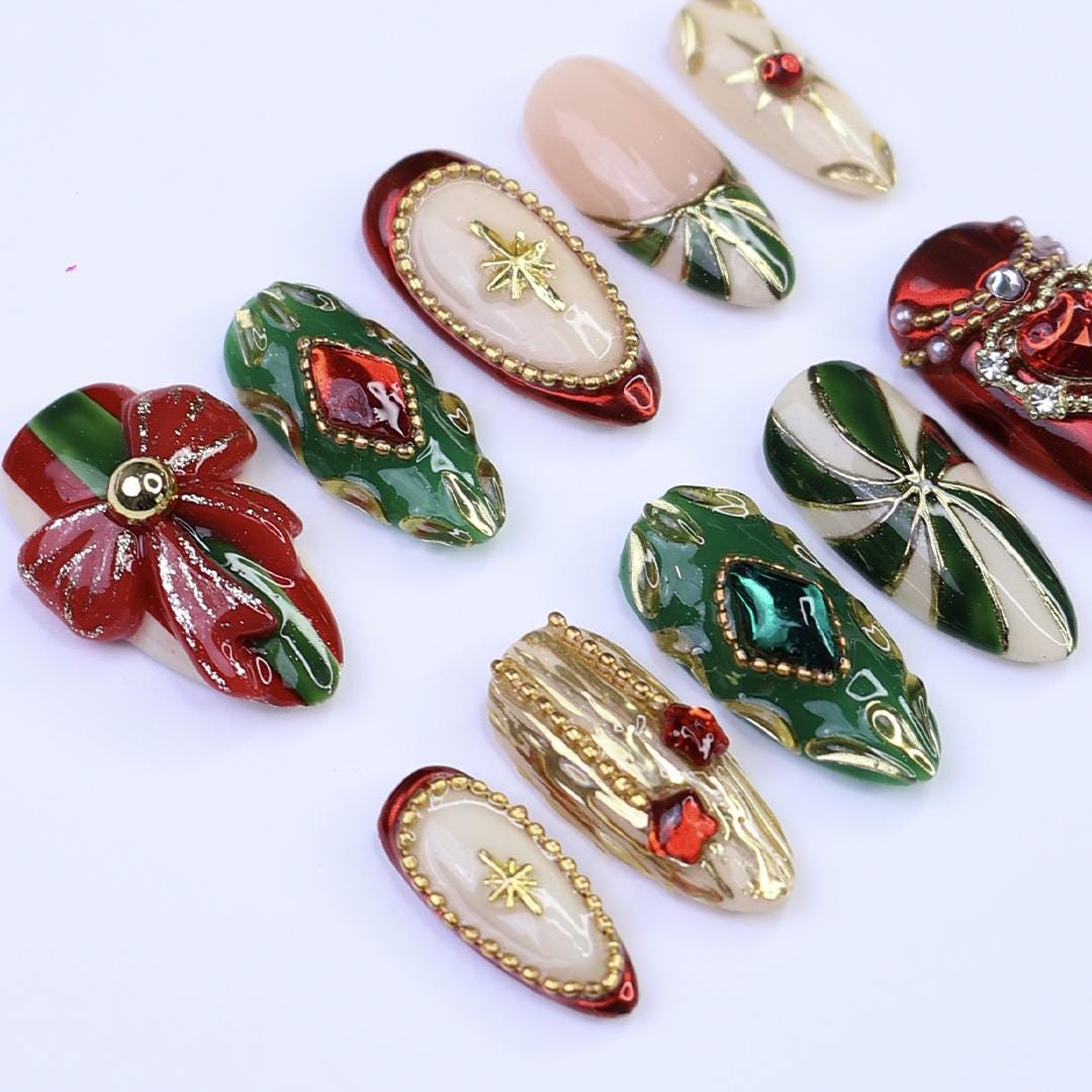 Ornate Christmas Press-On Nails With Red Bow, Emerald Gems and Gold Starbursts