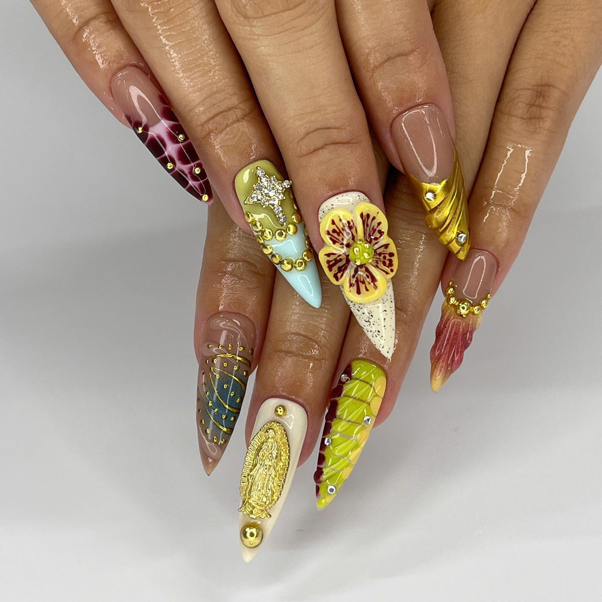 Ornate Green and Burgundy Floral Nails with Gold Details