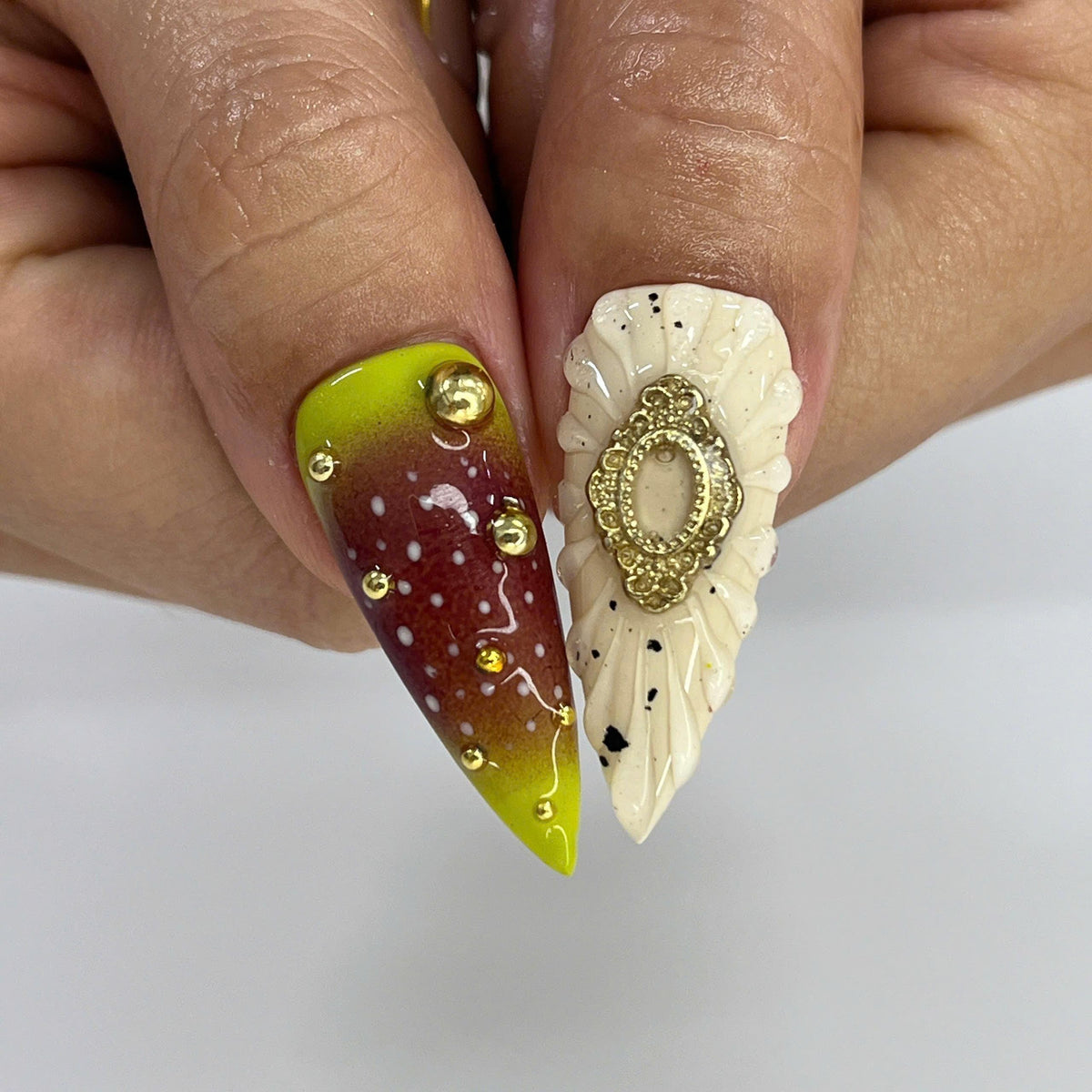 Ornate Green and Burgundy Floral Nails with Gold Details