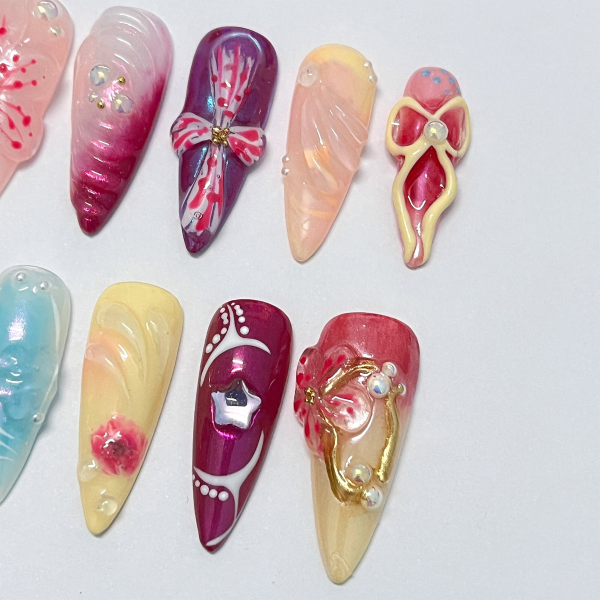 Ornate Spring Floral Nail Set With 3D Flowers, Bows, Gold Details, and Rhinestones