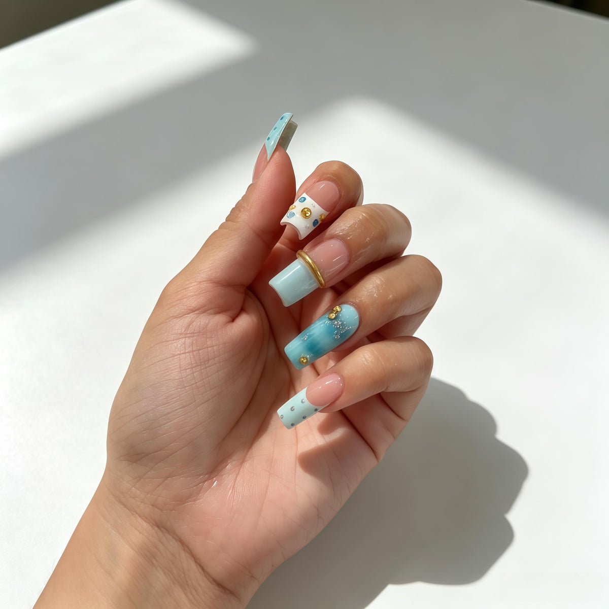 Pale Blue Marble Press On Nails With Gold Beads and Silver Glitter
