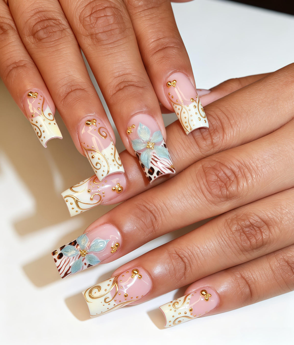 Pale Pink and Ivory Nails with Gold Swirls, Blue Flowers and Leopard Accents