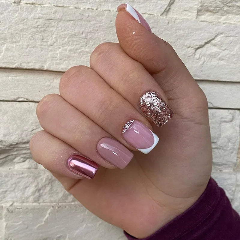 Pale Pink French Tip Nails With Rose Gold Chrome and Glitter