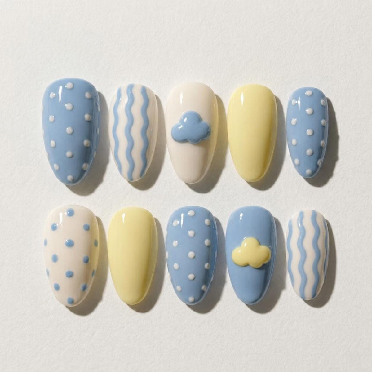 Pastel Blue and Yellow Cloud, Dot, and Wavy Stripe Nail Set