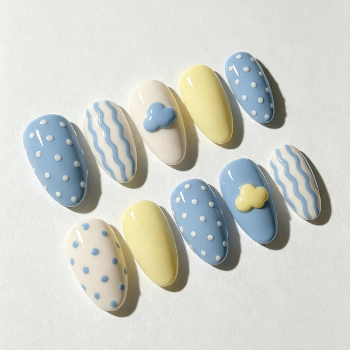 Pastel Blue and Yellow Cloud, Dot, and Wavy Stripe Nail Set