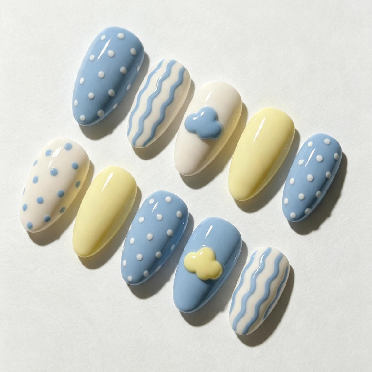Pastel Blue and Yellow Cloud, Dot, and Wavy Stripe Nail Set