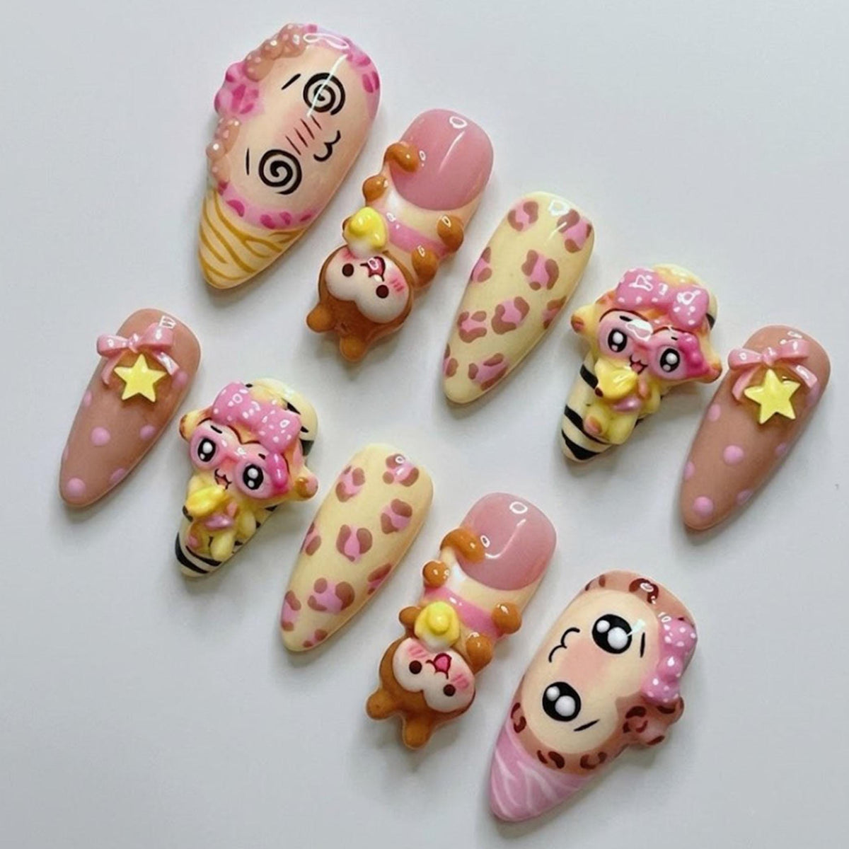 Pastel Pink and Yellow Leopard Monkey Nails with 3D Bows and Star Charms