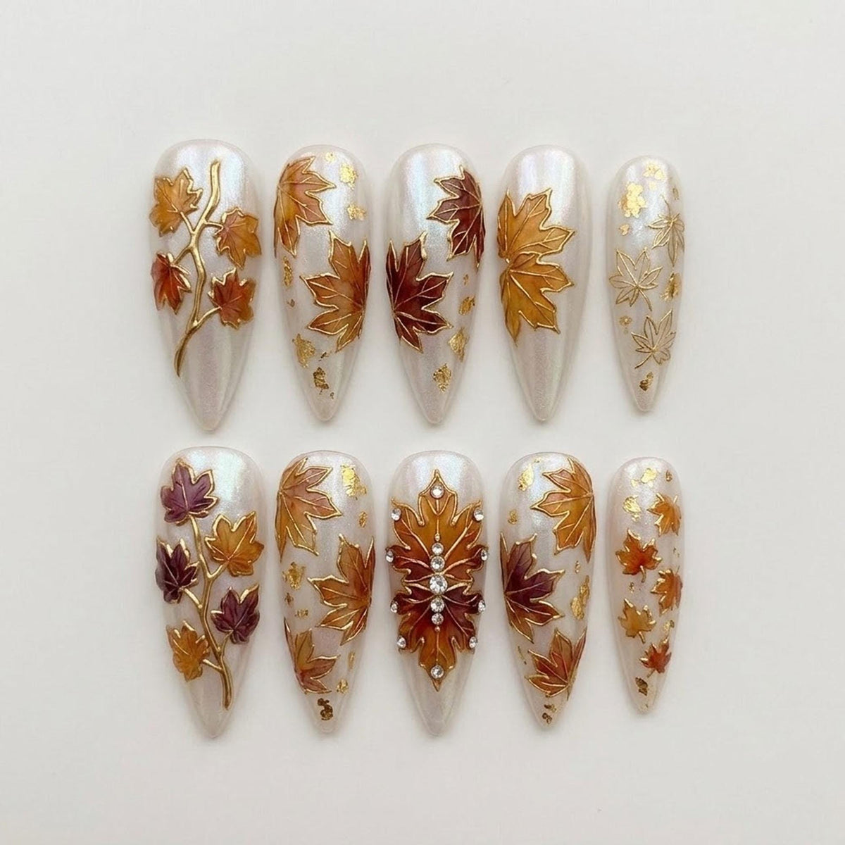 Pearl Ivory Autumn Leaf Press-On Nail Set With Gold Foil and Jeweled Maple Leaf Accent