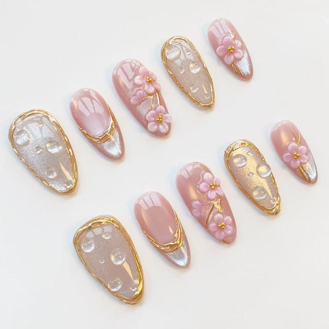 Pink 3D Flower Nails with Gold Accents and Silver Cat-Eye Glitter