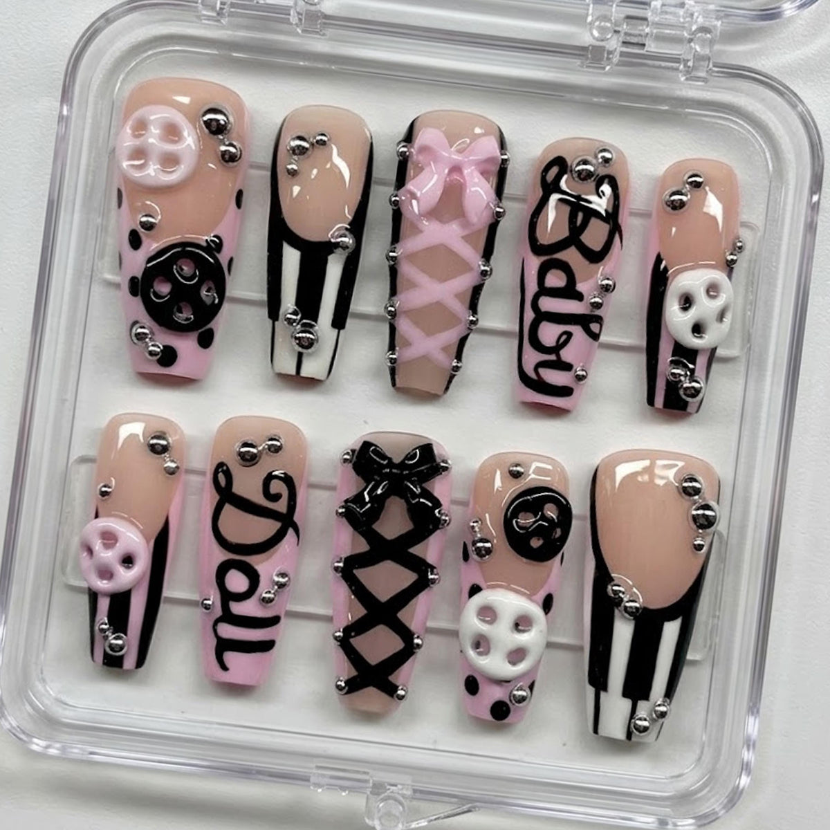 Pink and Black Coquette Corset Nails with Bows, Buttons, and Stripes