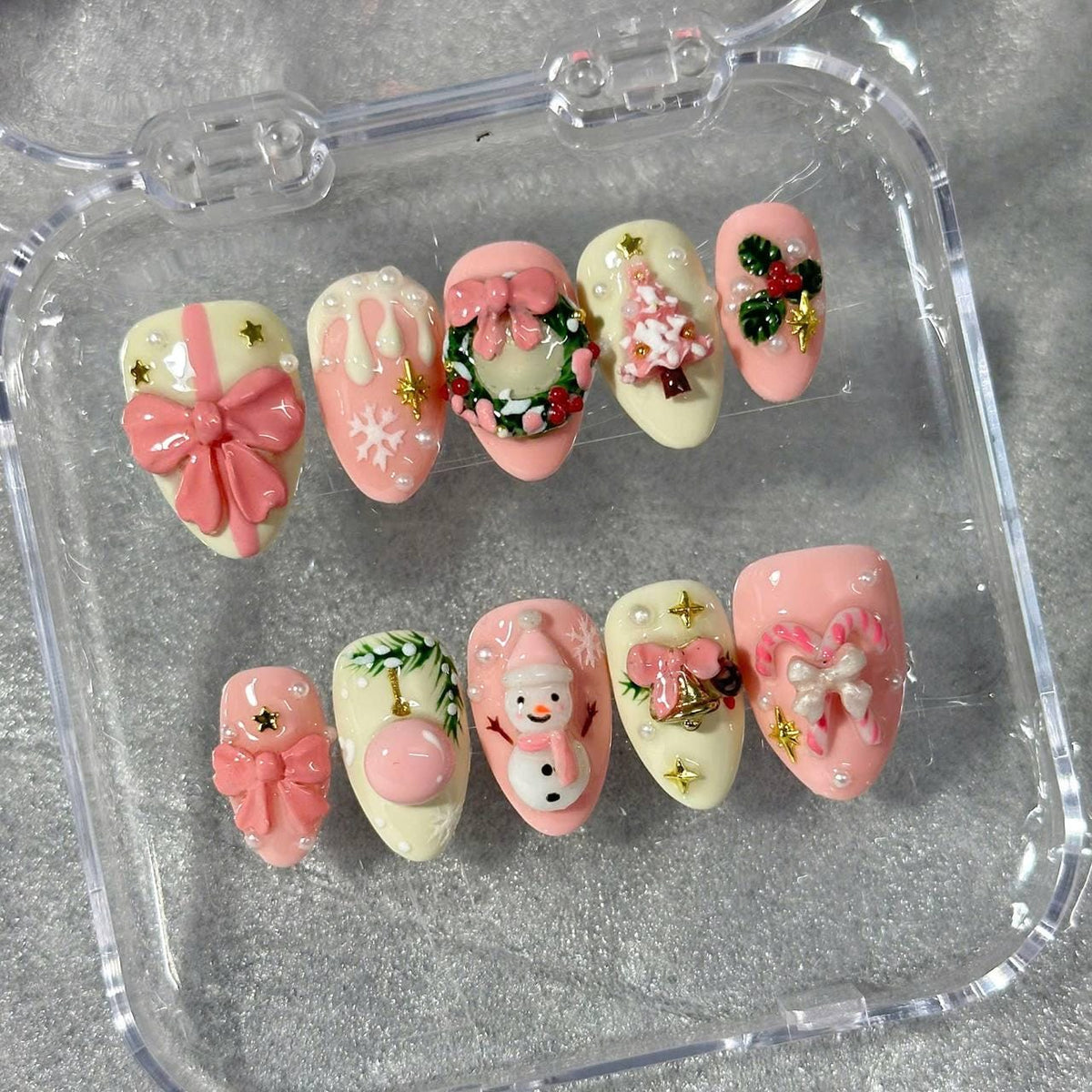Pink and Ivory Christmas Nails With Snowmen, Trees, Wreaths, and 3D Bows