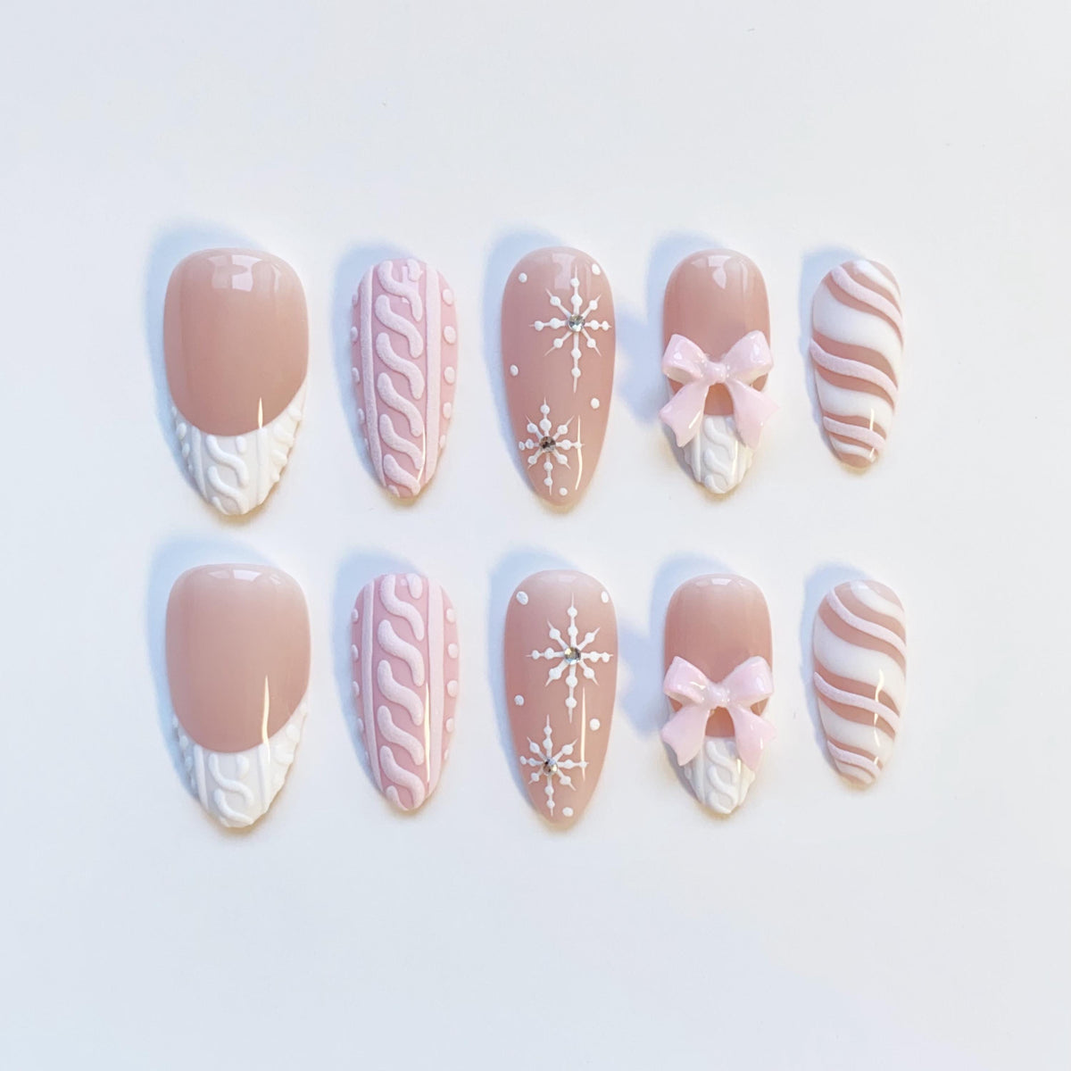 Pink and Nude-Taupe Christmas Winter Nails With Sweater Texture, Snowflakes, and Bows