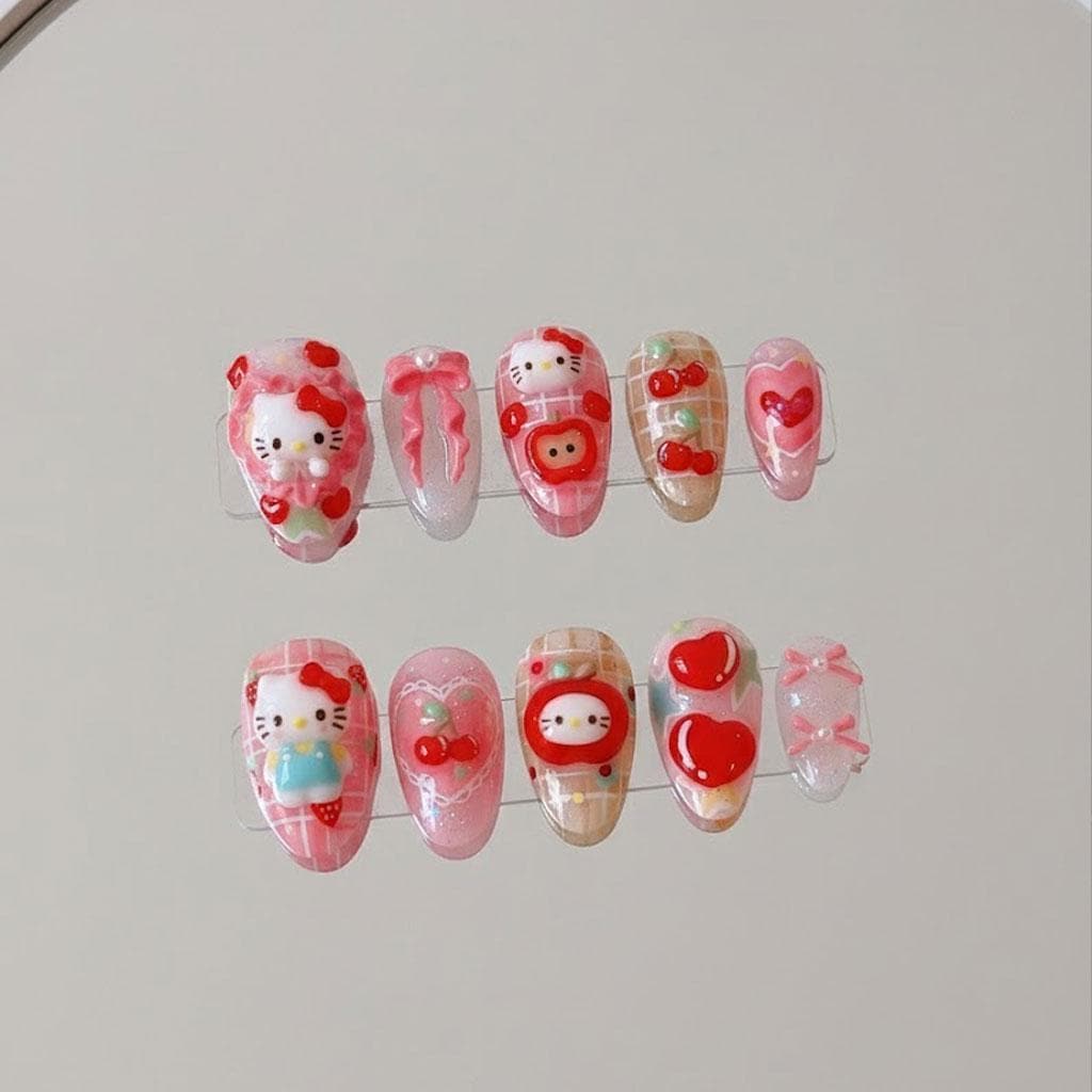 Pink and White Nails With Cat Faces, Red Hearts, Cherries, Bows, and Plaid Details