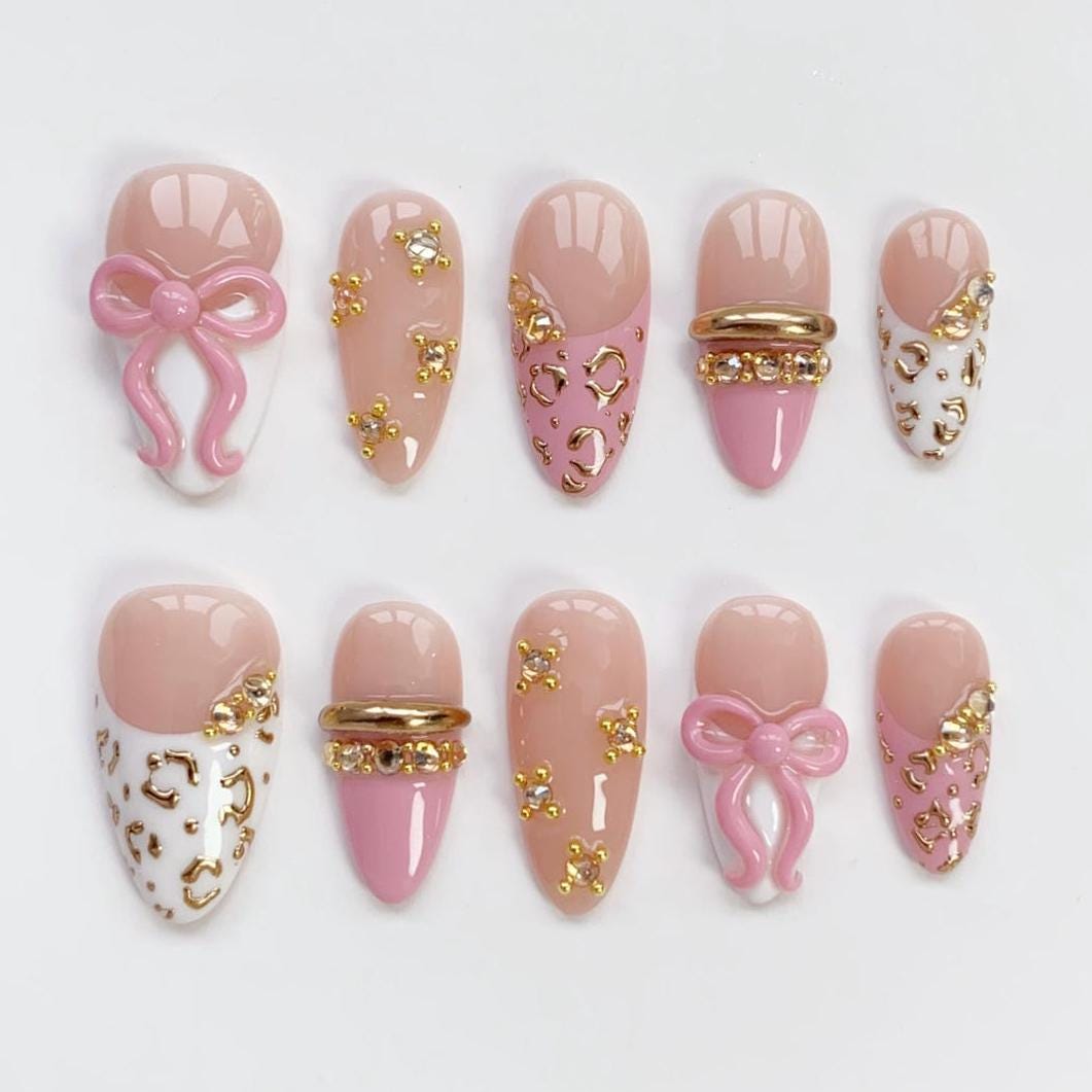 Pink Bow Birthday Nail Set With Gold Leopard Spots, French Tips, and Rhinestones