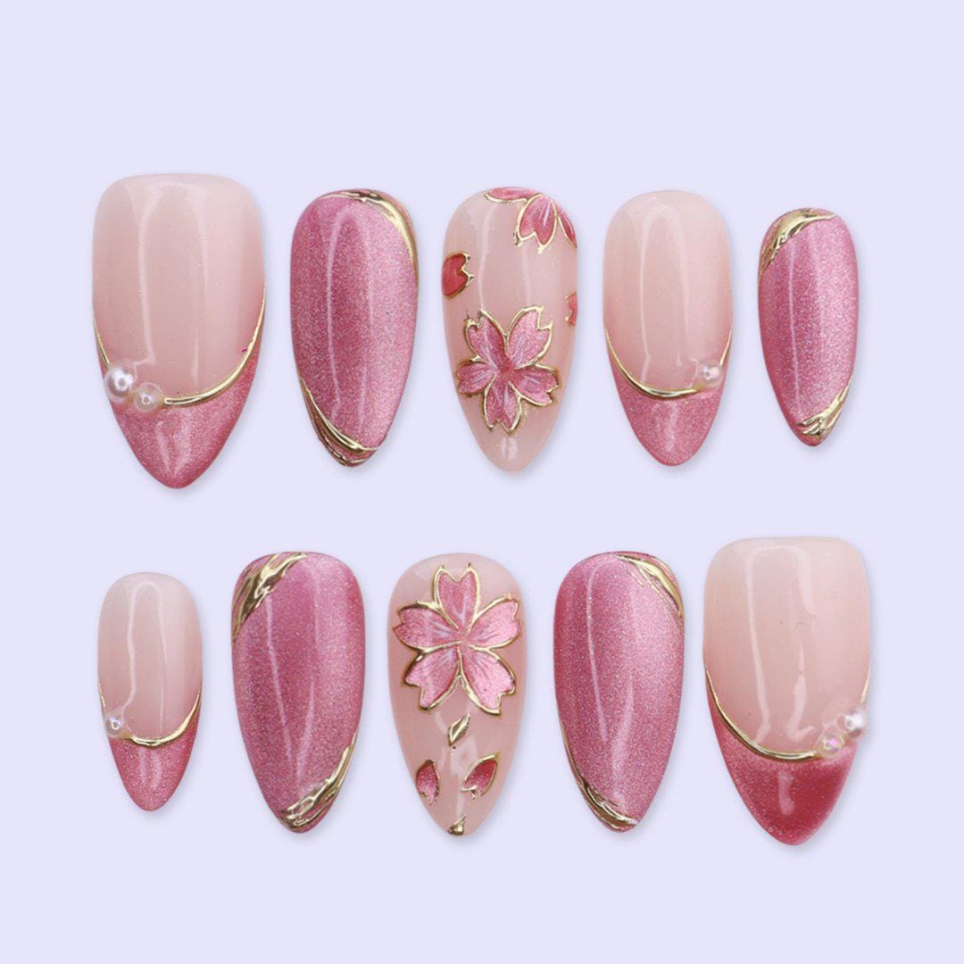 Pink Cat Eye Nails with Gold Floral Art and Pearl Accents for Spring and Weddings