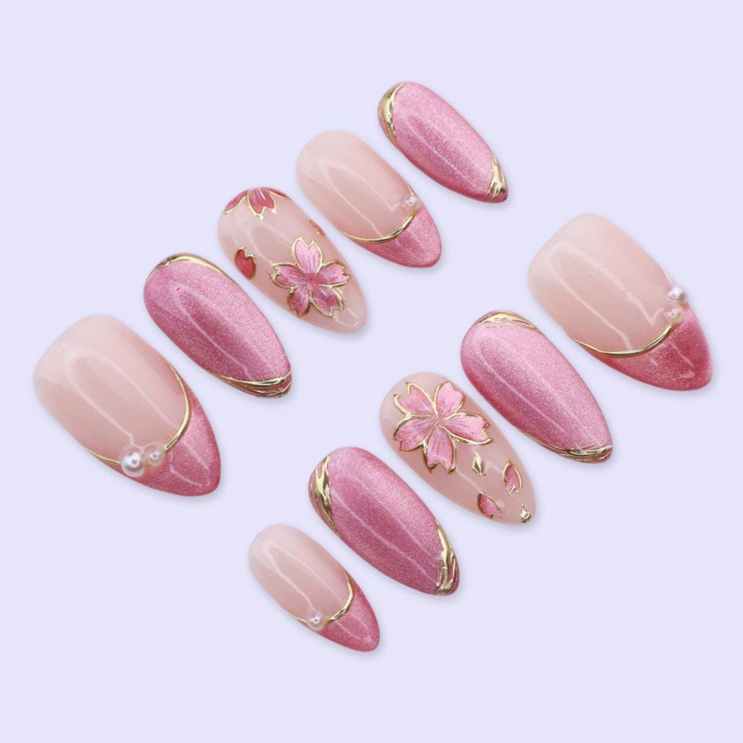 Pink Cat Eye Nails with Gold Floral Art and Pearl Accents for Spring and Weddings