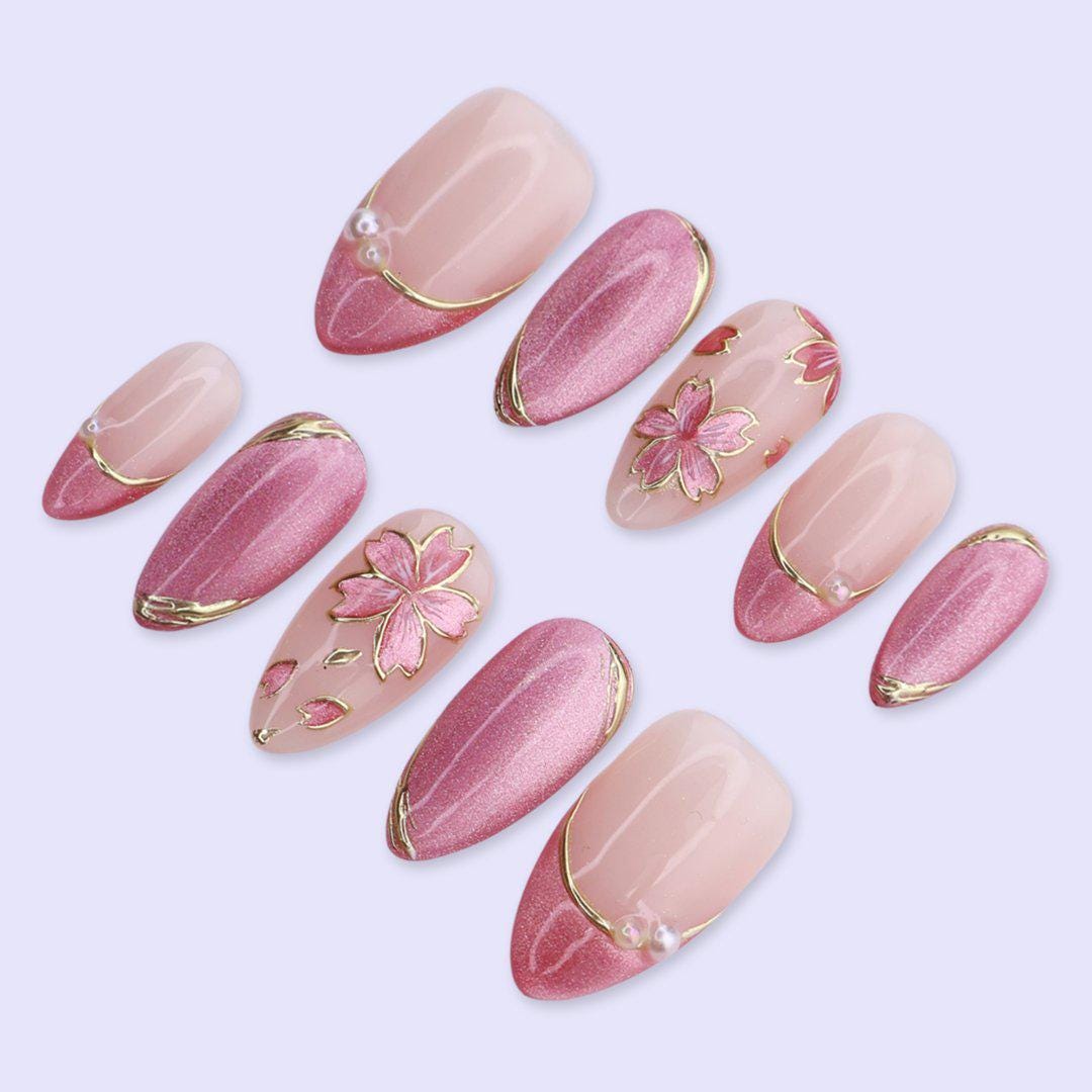 Pink Cat Eye Nails with Gold Floral Art and Pearl Accents for Spring and Weddings