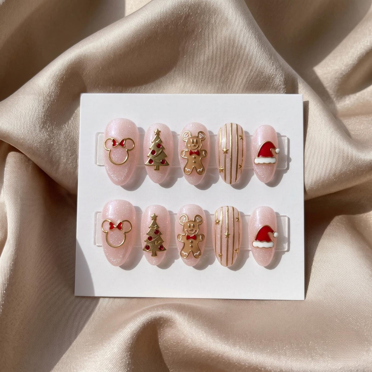 Pink Christmas Nail Set With Gingerbread, Trees, Mouse Ears and Santa Hats