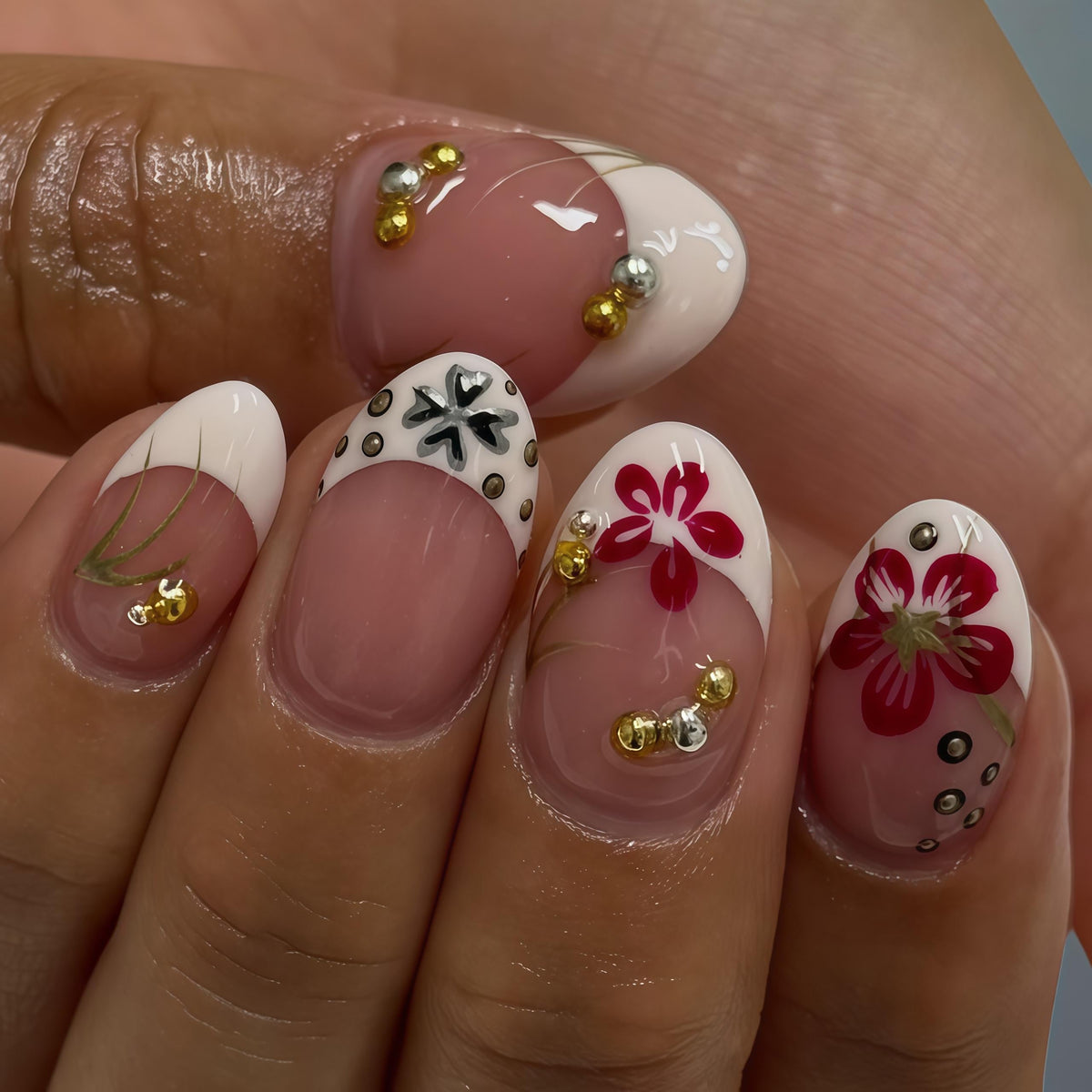 Pink French Tip Nails with Red and Black Floral Art and Gold Silver Accents