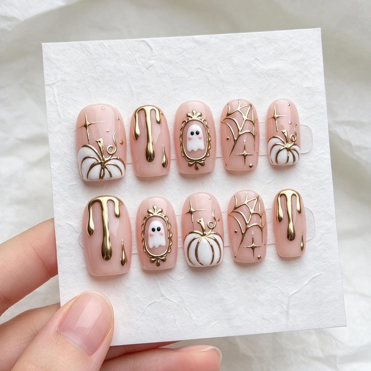 Pink Halloween Press-On Nails With Gold Ghosts, Pumpkins and Chrome Accents