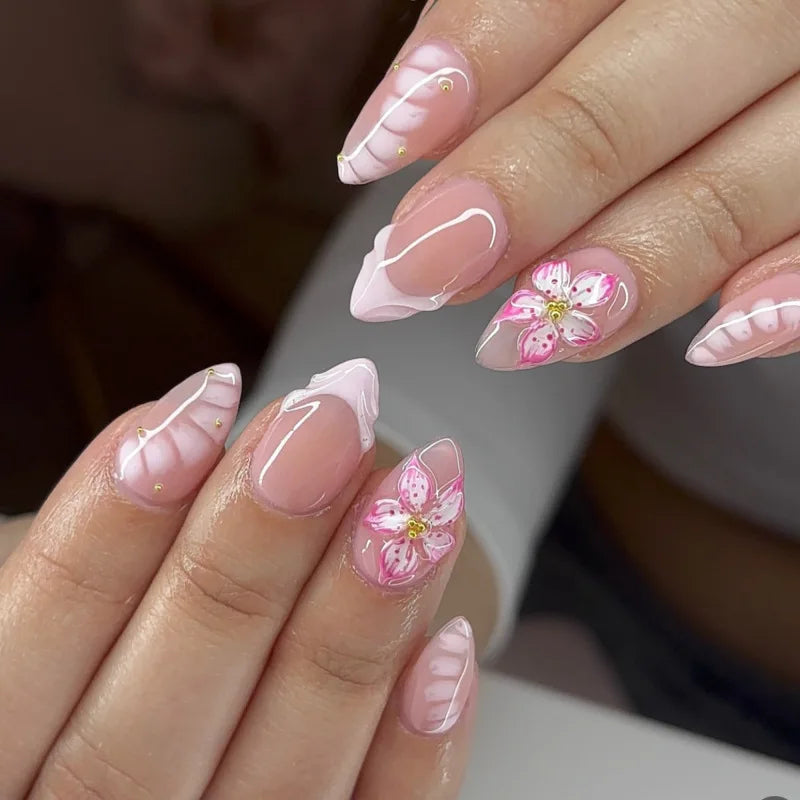 Pink Hibiscus French Tip Nails with White Curved Lines and Gold Accents