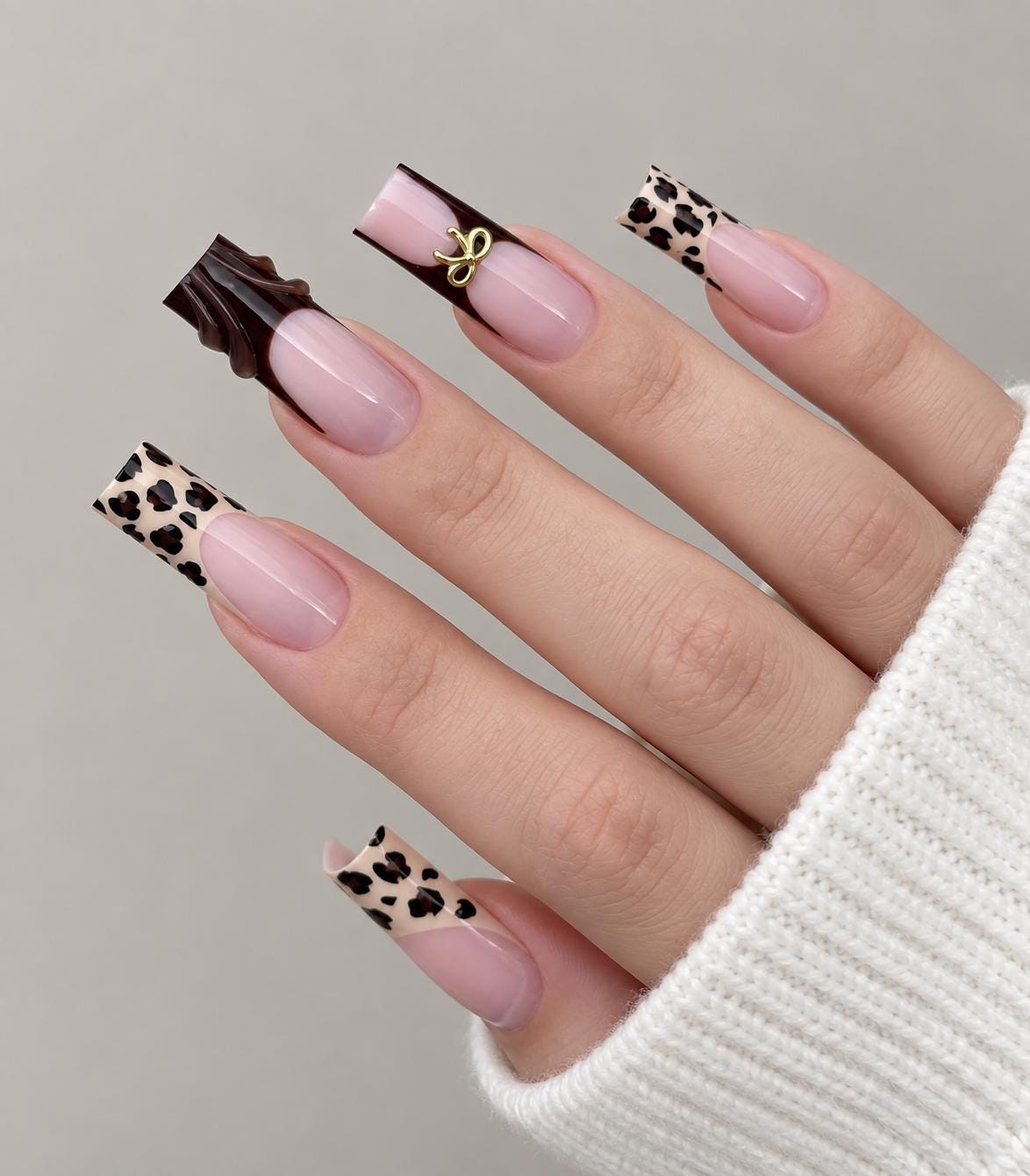 Pink Nude Animal Print Tip Nails With Brown Accent and Gold Bow Charm for Fall and Winter