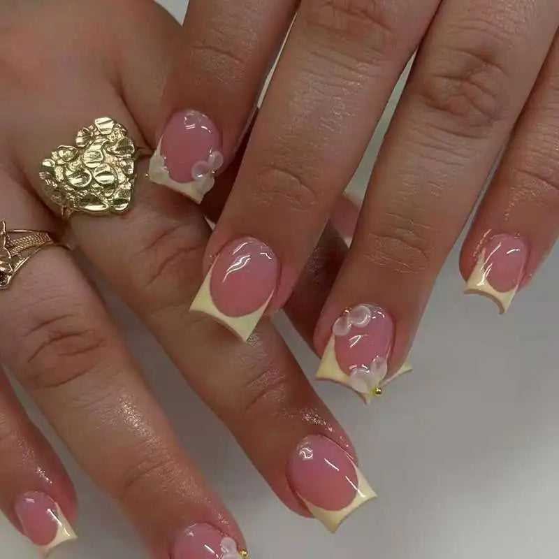 Pink Nude French Tip Nails with Raised Translucent Bows and Gold Accent