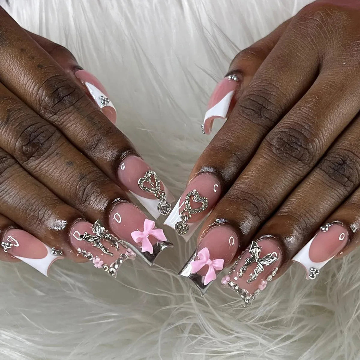 Pink Nude French Tip Nails With Silver Scrollwork, Rhinestones, and 3D Bows