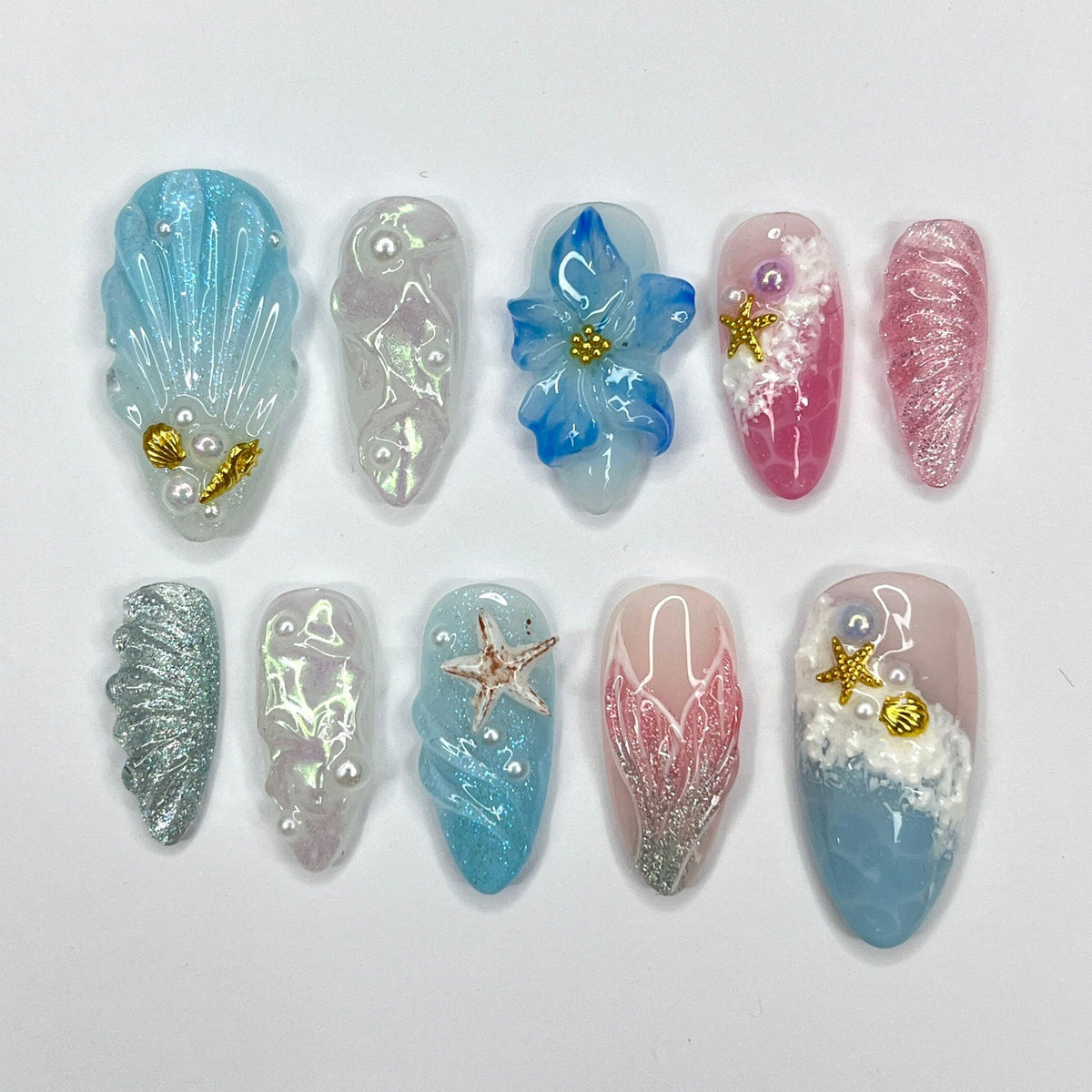 Mermaid-Inspired Summer Ocean Nails with 3D Shells, Flowers, and Starfish
