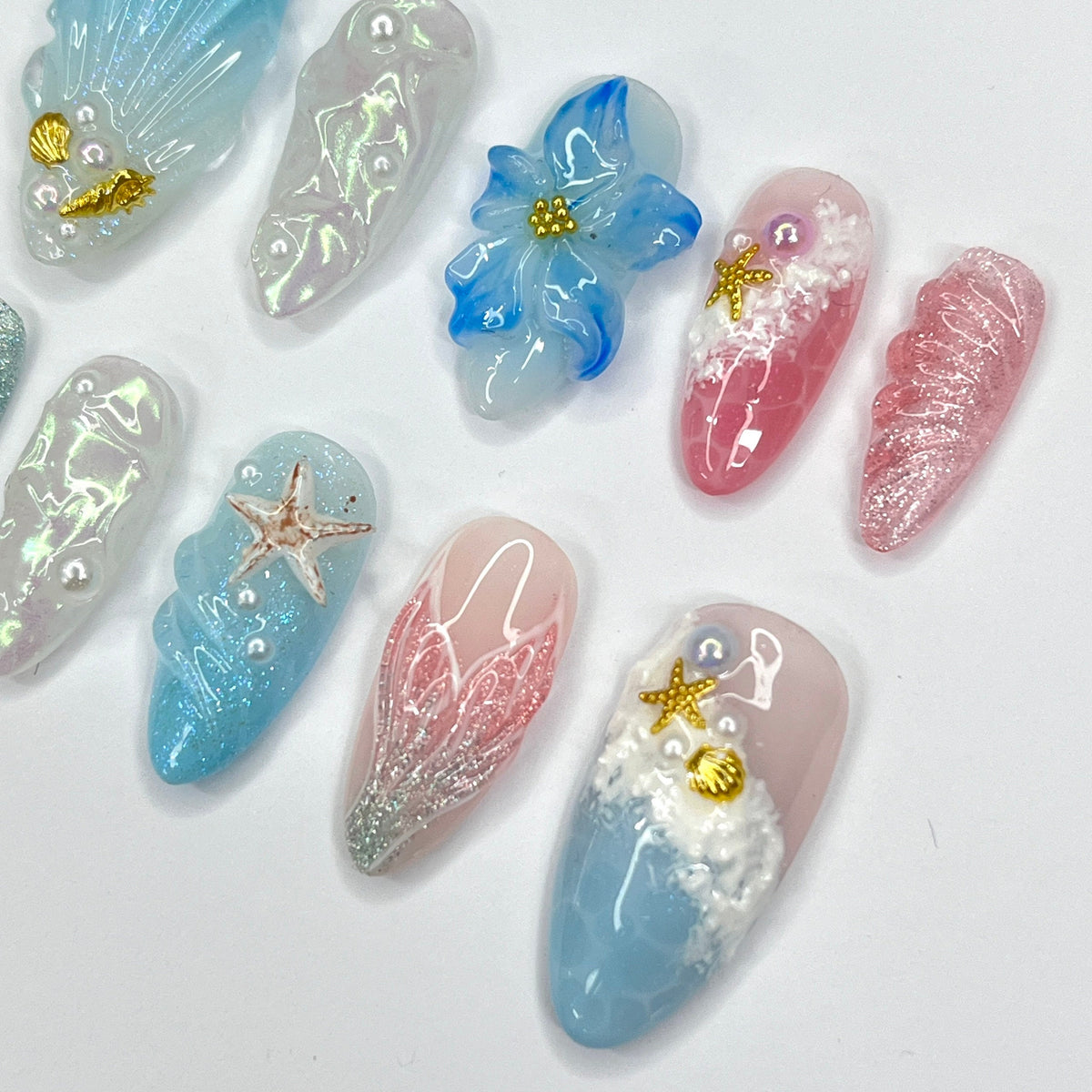 Mermaid-Inspired Summer Ocean Nails with 3D Shells, Flowers, and Starfish