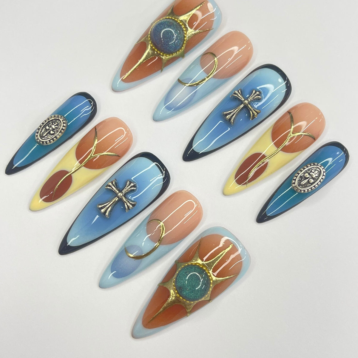 Summer Blue and Terracotta Nails with Gold-Tone Medallions