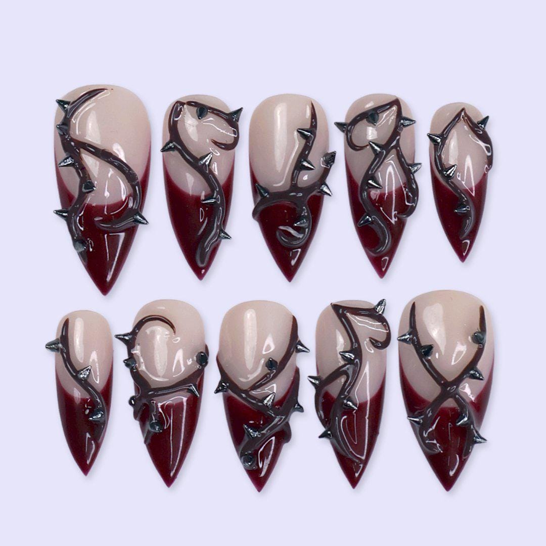 Halloween Burgundy French Tip Nails With Raised Metallic Thorn Details