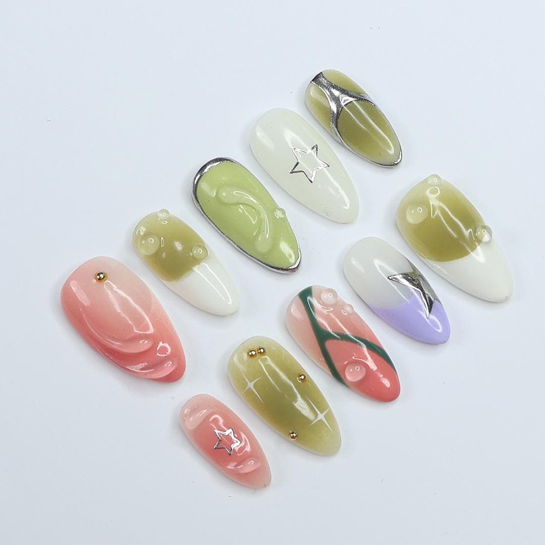 Coral Pink and Green Y2K Nails with Bubble Accents and Silver Stars
