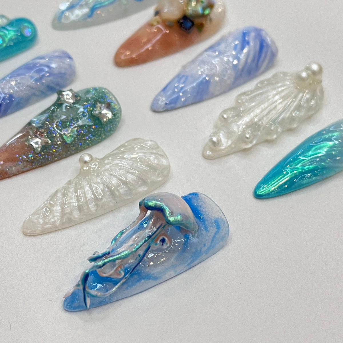 Ocean-Inspired Press On Nails With 3D Jellyfish, Shells, and Pearlescent Details