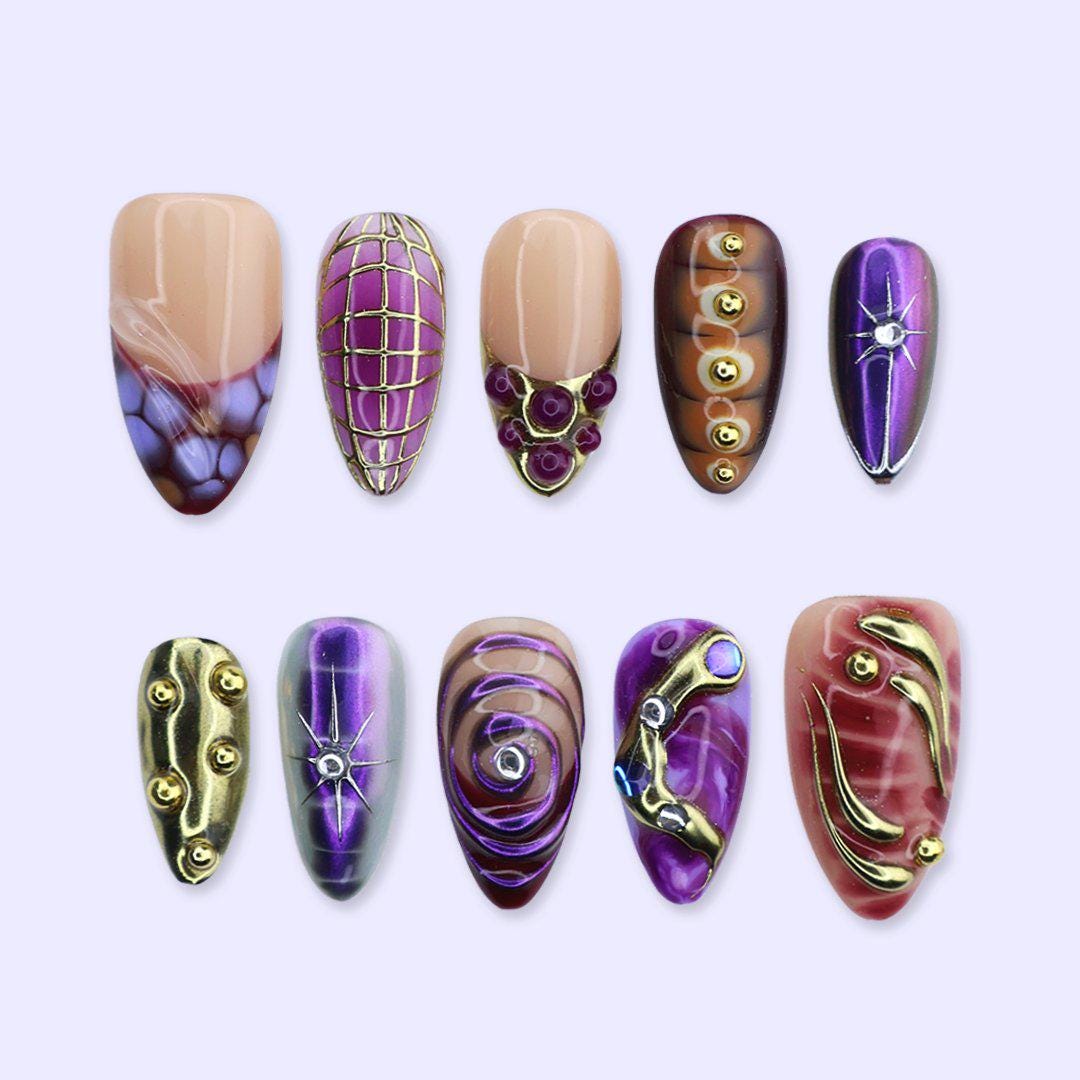 Y2K Purple and Burgundy Chrome Nails with Gold Grids, Swirls and Gem Accents