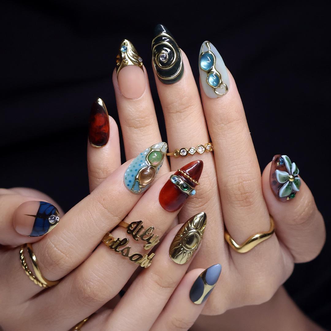 Fall Jewel-Toned Teal and Amber Nails with Gold Swirls and 3D Flower