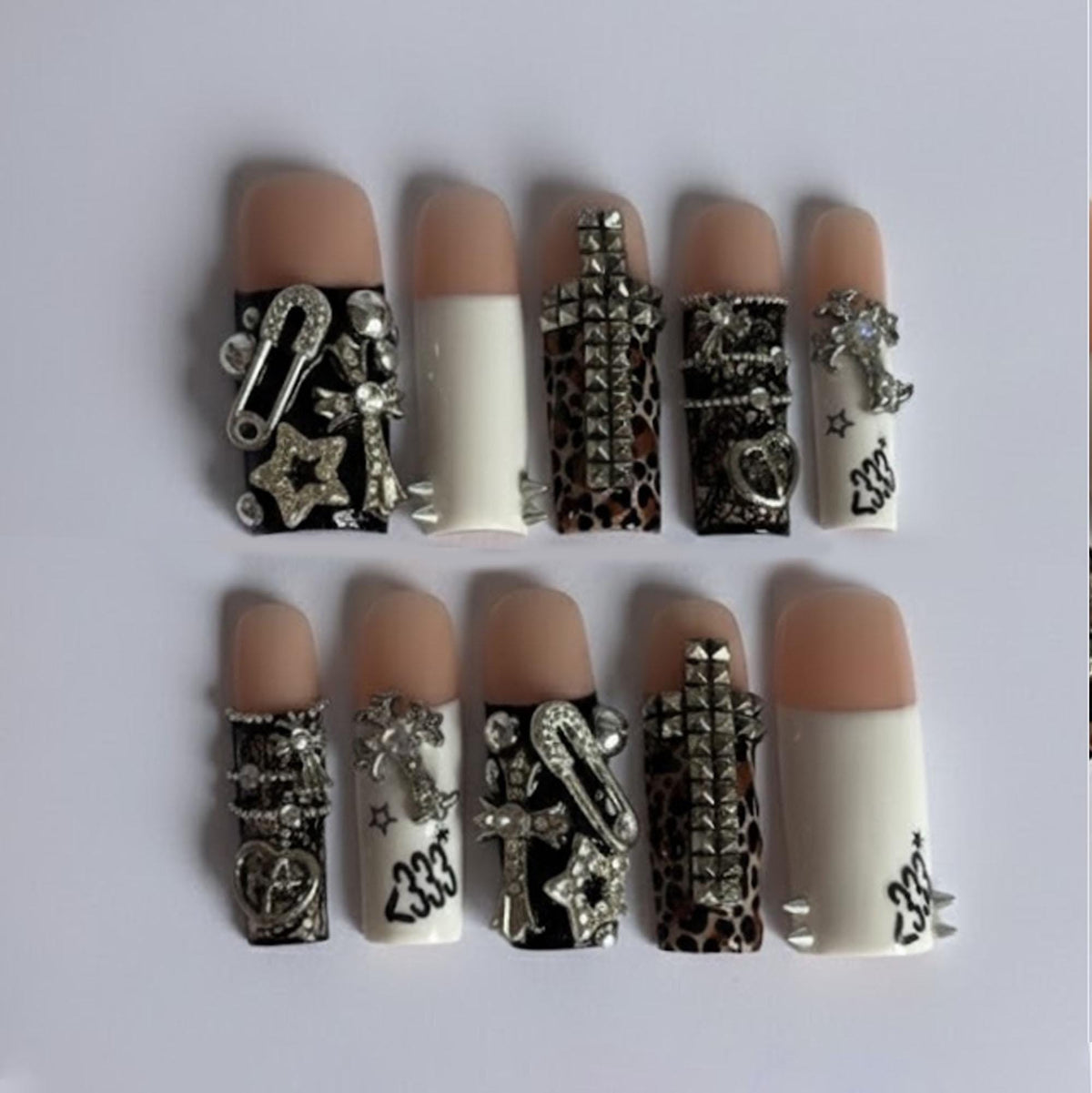 Punk-Inspired Leopard Print Nail Set With Silver-Tone Studs and Charms