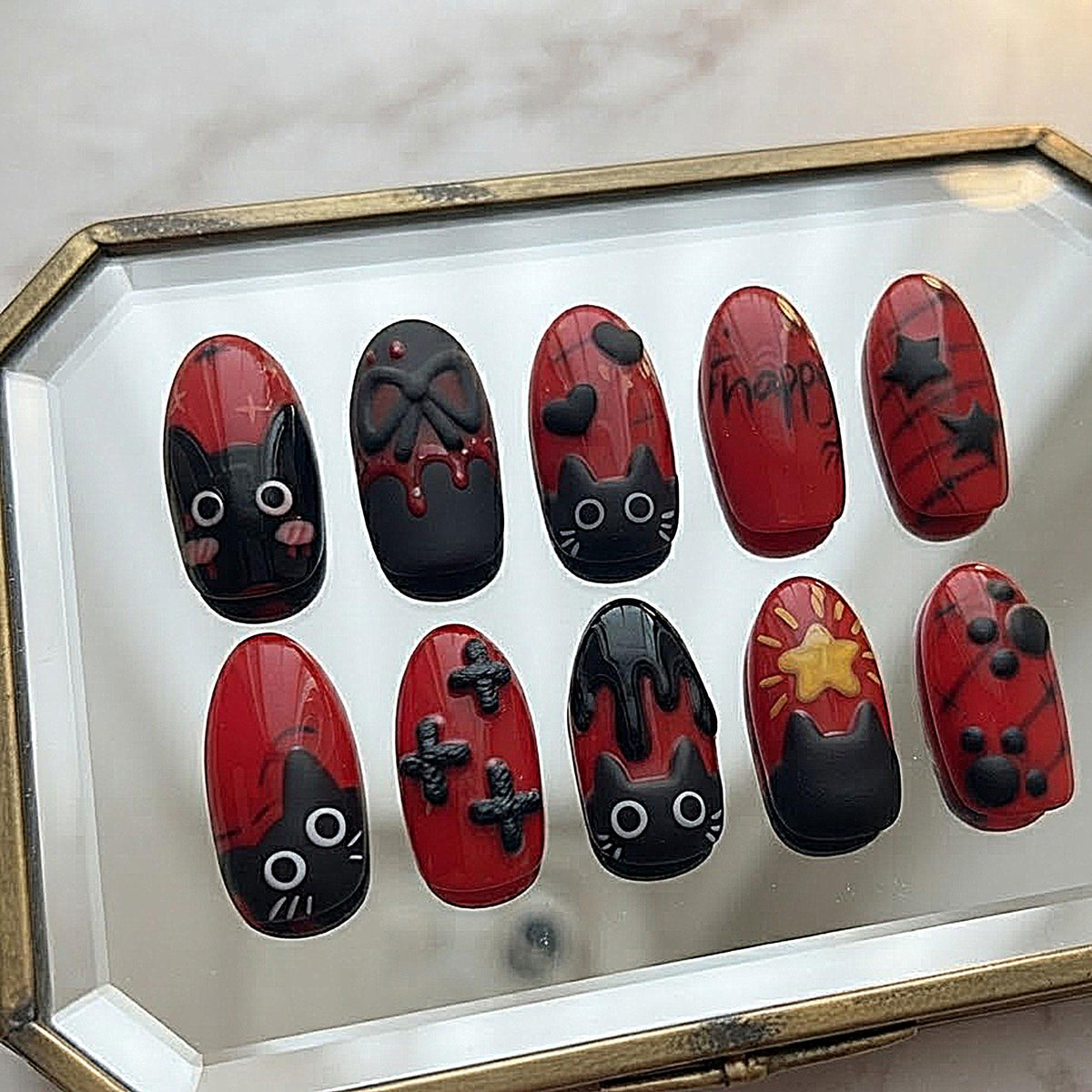 Red and Black Gothic Cat Nails with Bows, Stars and Halloween Details