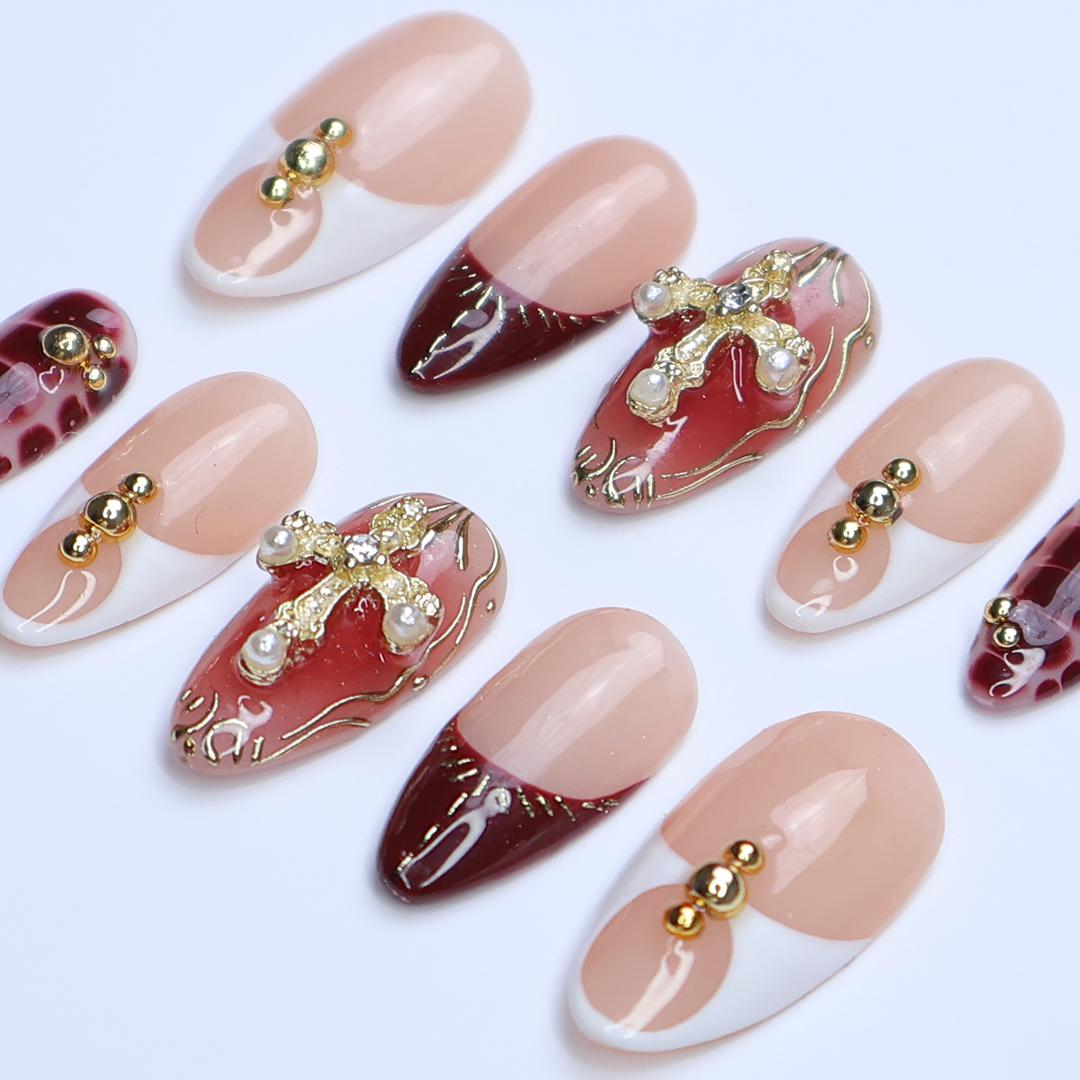Red and Gold Cross Press-On Nails With Burgundy Marble French Tips