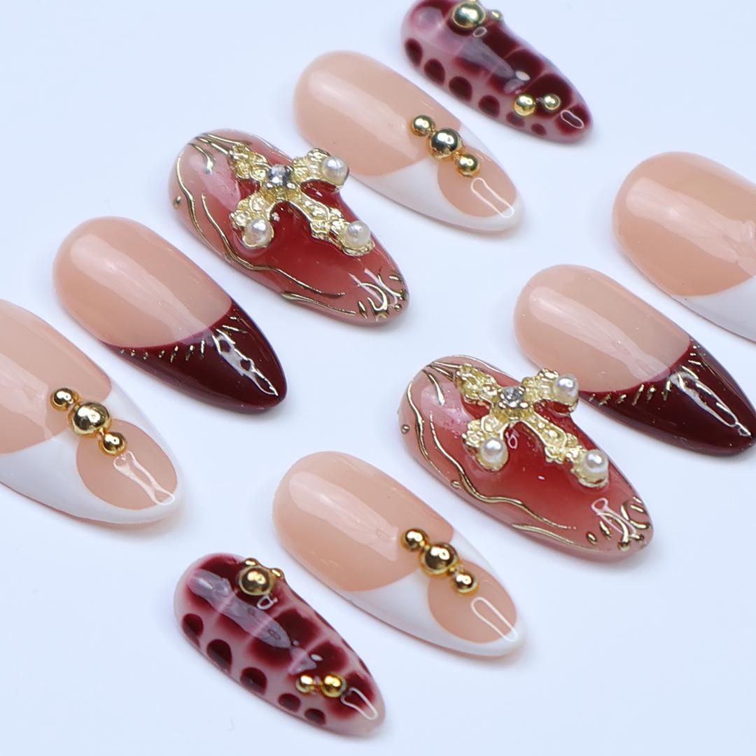 Red and Gold Cross Press-On Nails With Burgundy Marble French Tips