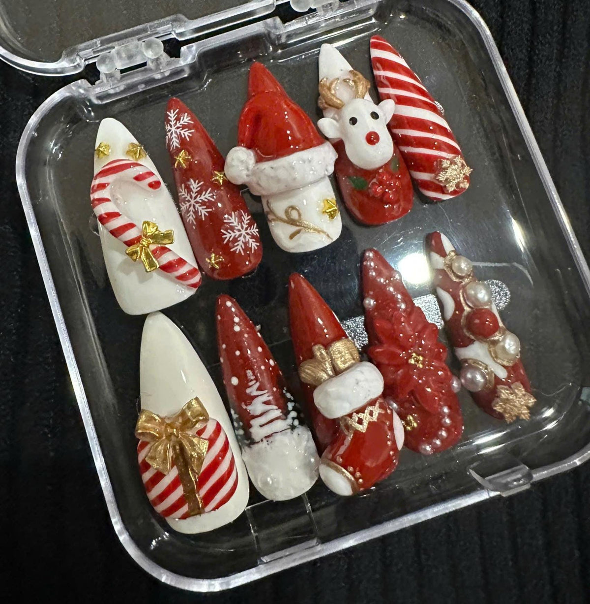 Red and White Christmas Press On Nails with Candy Cane Stripes, Reindeer, Snowflakes and 3D Accents