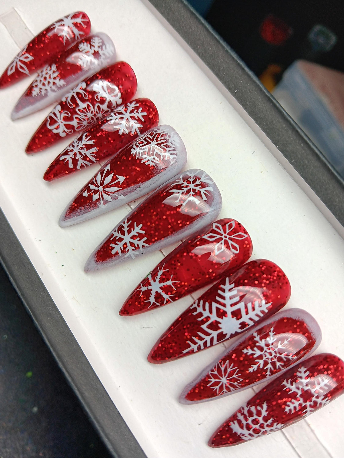 Red Glitter and Icy Translucent Snowflake Christmas Nails
