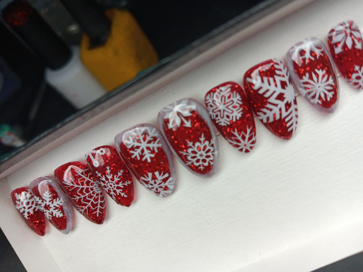 Red Glitter and Icy Translucent Snowflake Christmas Nails