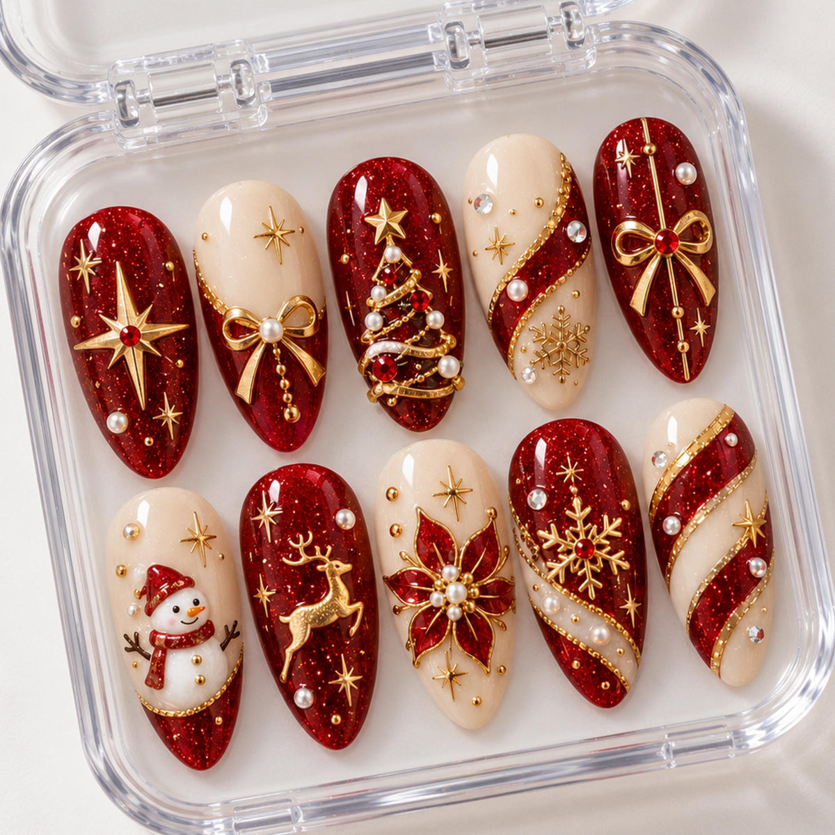 Red Glitter and Ivory Christmas Nails With Gold Bows, Trees, and Winter Motifs
