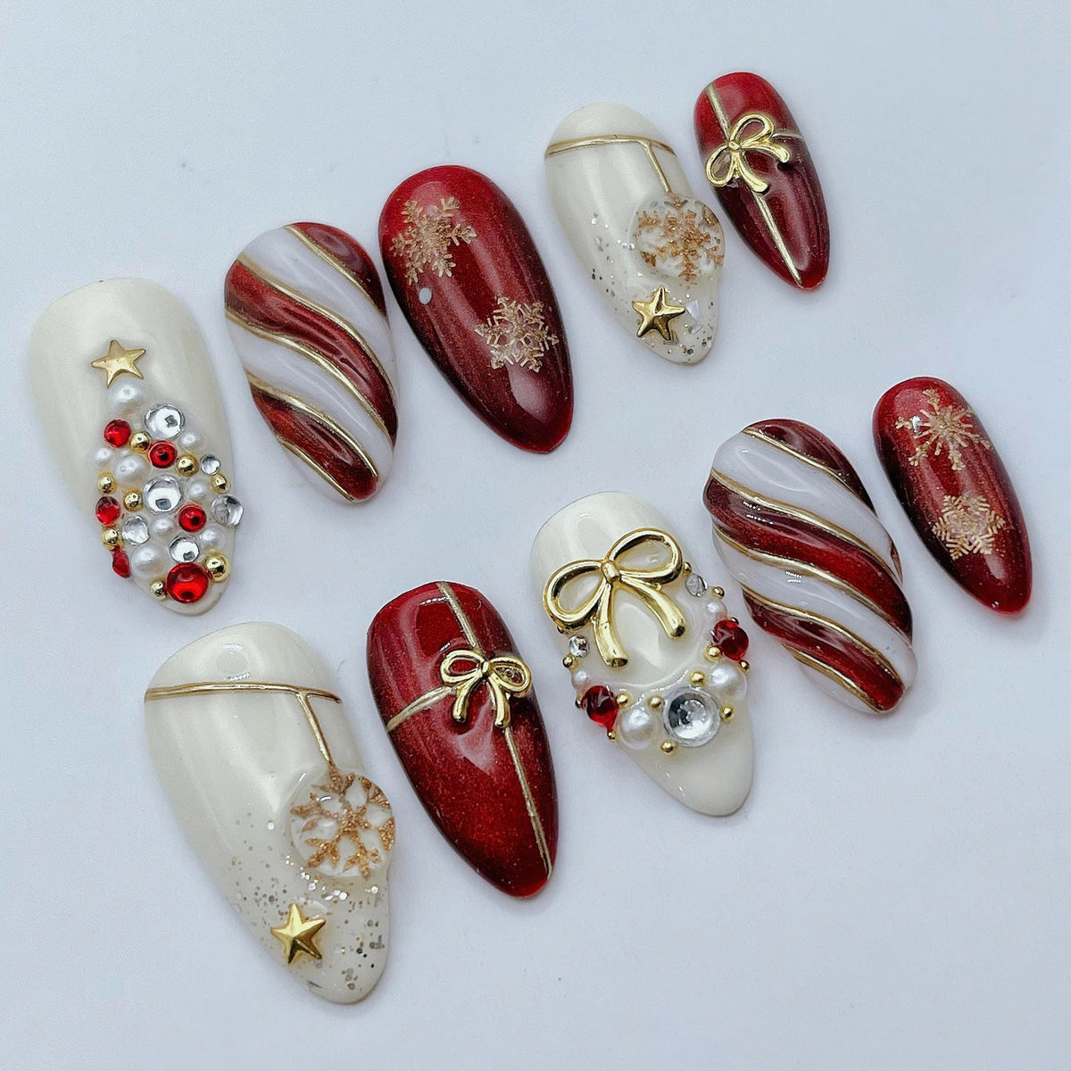 Red, Ivory & Gold Christmas Nails with Bows, Snowflakes and Rhinestones